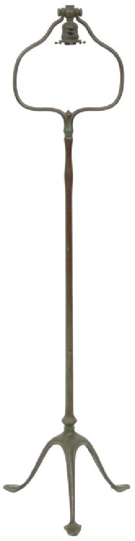 Tiffany Studios Bronze Harp Floor Lamp Base: Tiffany Studios Bronze Harp Floor Lamp Base. Tripod base with long legs and leafy pad feet, long stem and harp top with single pendant socket encased in the 2.25 in. dia. shade fitter. Signed "Tiffany