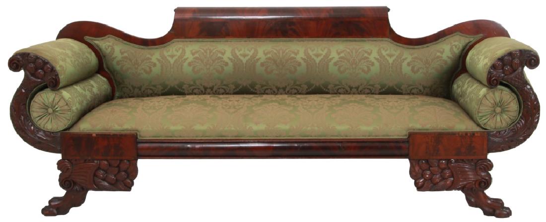 Federal Carved Mahogany Sofa: Federal Carved Mahogany Sofa. Wavy shaped back has a rolled crest rail, acanthus leaf cornucopia carved arm fronts overflowing with fruit and stands on claw feet with fruit and cornucopia carved corbe