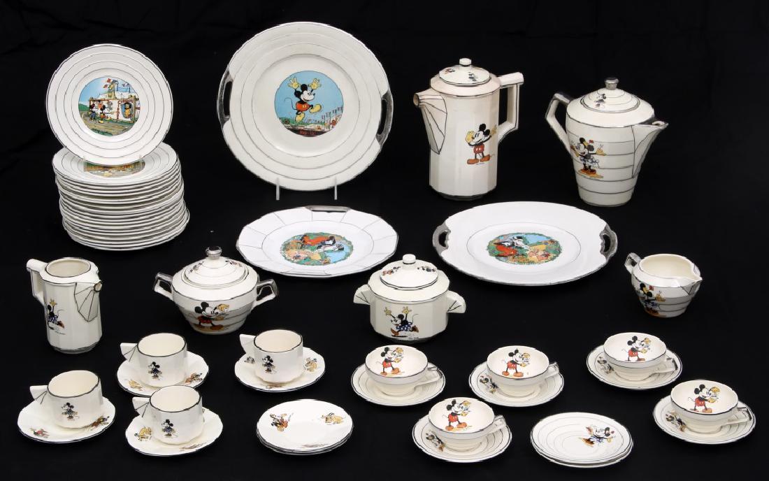 Mickey Mouse 42 Piece D'Onnaing Porcelain Tea Set: Mickey Mouse 42 Piece D'Onnaing Porcelain Tea Set . 42 assorted porcelain tea set pieces themed to Walt Disney's Mickey Mouse, Minnie Mouse and other characters; signed with "Faience, D'Onnaing, Franc