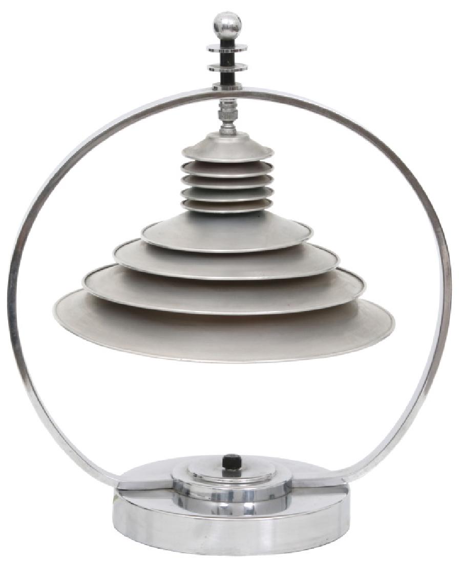 Markel Co. Machine Age Moderne Harp Table Lamp: Markel Co. Machine Age Moderne Double Harp Table Lamp, c.1930's. Chrome plated brass base with round harp having a 11.5 in. aluminum stepped saucer shade with single pendant socket. "Considered the Ro