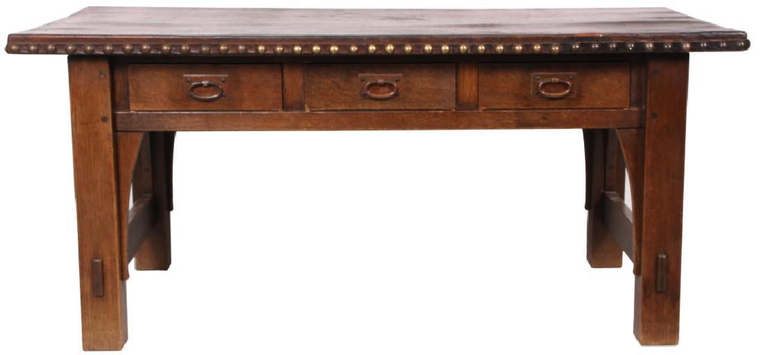 Gustav Stickley 1902 Model 460L Leather Top Desk: Gustav Stickley 1902 Model 460L Leather Top Desk. Large 66 in. desk has an original hard leather top with original tacks around the edge, the front has 3 drawers with oval hammered copper pulls, has s