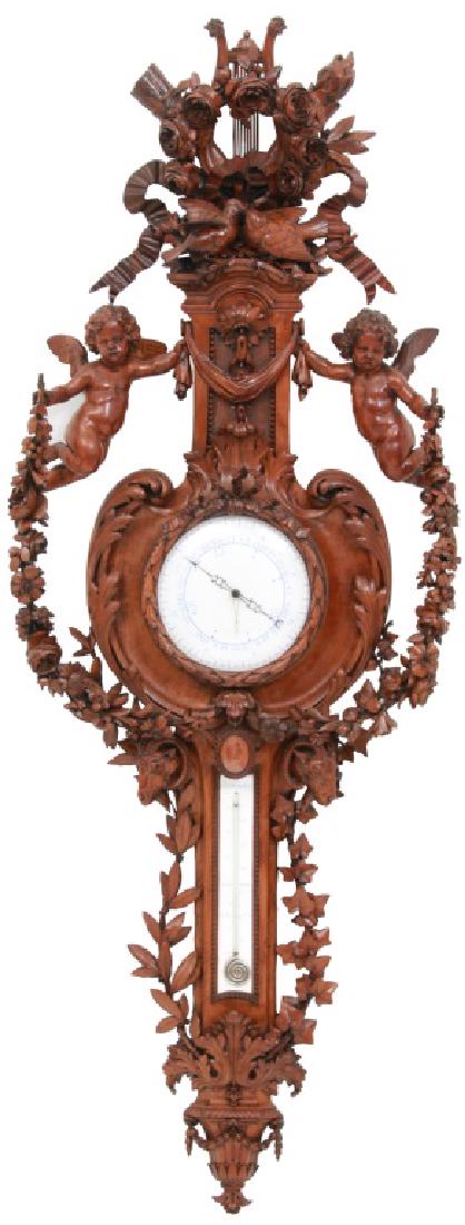 Intricate Carved Walnut Wall Barometer: Intricate Carved Walnut Wall Barometer. Crest is carved with a large lyre having rooster heads, crossed torch and arrow quiver, wreath of roses with a bowed ribbon and pair of birds, the case is flank