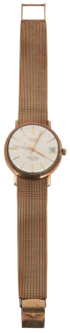Vintage Longines "Flagship" Men's Wristwatch: Vintage Longines "Flagship" Men's Wristwatch. Silvered dial signed "Longines, Flagship, Automatic" with winged hourglass logo, gold bar hour markers, gold hands and open calendar date aperture; #345 s