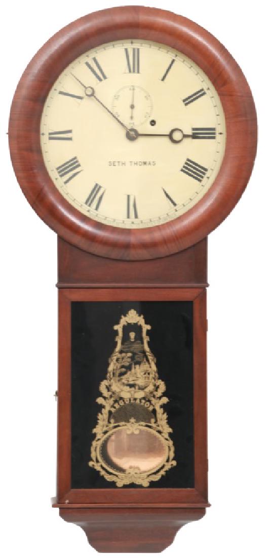 Seth Thomas Rosewood Regulator No. 2: Seth Thomas Rosewood Regulator No. 2. 12" painted metal dial with black Roman hour numerals, sub seconds and blued open moon hands; brass 8 day weight driven time only movement has a Graham deadbeat e