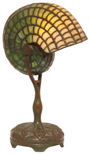 Tiffany Studios Leaded Nautilus Desk Lamp: Tiffany Studios Leaded Nautilus Desk Lamp. The beautiful shade forms a large nautilus shell in 13 geometric rows of green striated glass; on a bronze base signed "Tiffany Studios, New York, 28628"