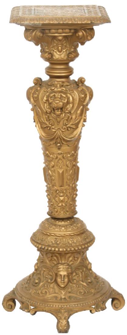 Cast Spelter Rococo Pedestal: Cast Spelter Rococo Pedestal. 12' wide x 12" deep filigree decorated top over a scrolled capital, the tapered body has lion's heads, medallions, filigree and stands on 4 scrolled feet; very good overa