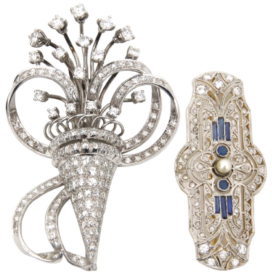 Two Platinum, Gold and Diamond Brooches: 2 Platinum, Gold and Diamond Brooches. 1) 2.25 in. x 1.5 in. platinum brooch with an 18K white gold pin, joint and barrel safety catch. The triangular base is pave set with single cut diamonds holding