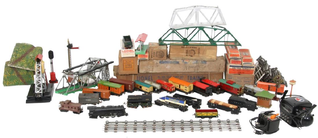 Lot of Lionel Trains, Tracks and Accessories: Large lot of trains, tracks and other accessories including transformers, bridges, tunnels, etc. Some with original boxes.