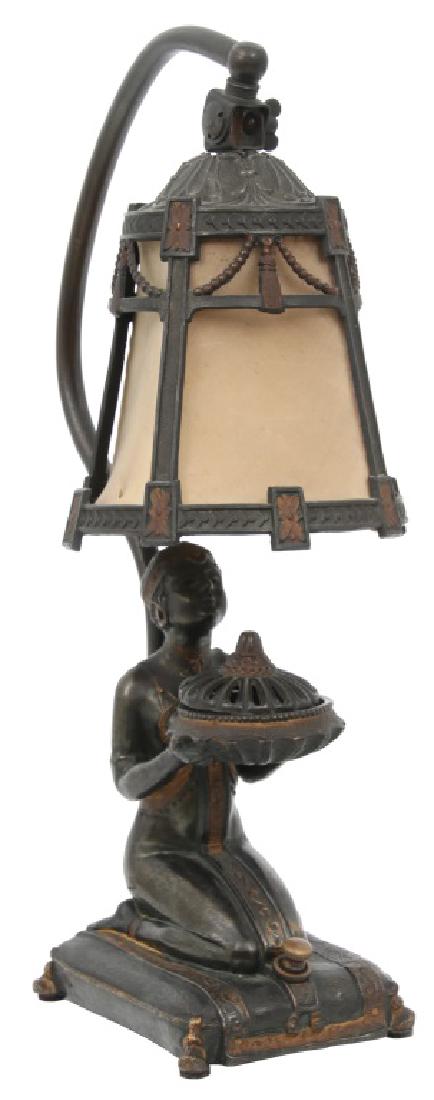 L.V. Aronson Deco Incense Burner Lamp: L.V. Aronson Deco Incense Burner Lamp. Excellent cast spelter figure of an Egyptian woman kneeling on a pillow and presenting an incense burner dish in her hands; a single arm reaches up from behind h