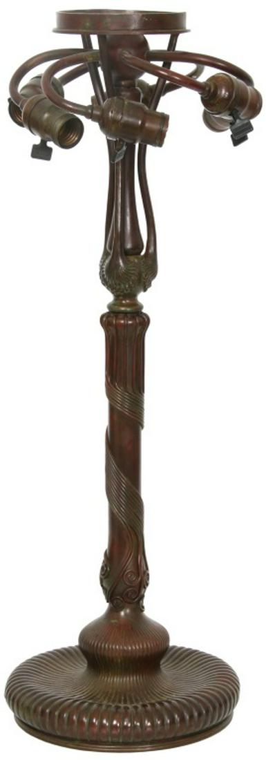 Tiffany Studios Lamp Base, #315: Tiffany Studios Lamp Base, #315. A bronze Tiffany Studios lamp base with multiple applied coils and 6 arm light cluster with original Bryant sockets and Perkins turn switches; signed on base, "Tiffany