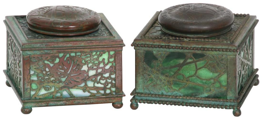 Tiffany Studios Grapevine Inkwells: Tiffany Studios Grapevine Inkwells. Tiffany inkwells have a pierced grapevine pattern overlaid on panels of green and white striated glass with hinged lids that open to reveal the well; the inkwell on
