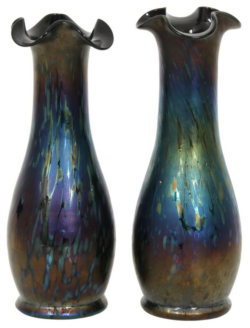 Pair of Attributed Loetz Art Glass Vases: Attributed Loetz Art Glass Vases. Vases have a multi-colored iridescent oil spot pattern, in typical vase form with a ruffled rim, unsigned. Dimensions: 8 3/4 in. high; 9 in. high. Weight: 1.25 lbs.