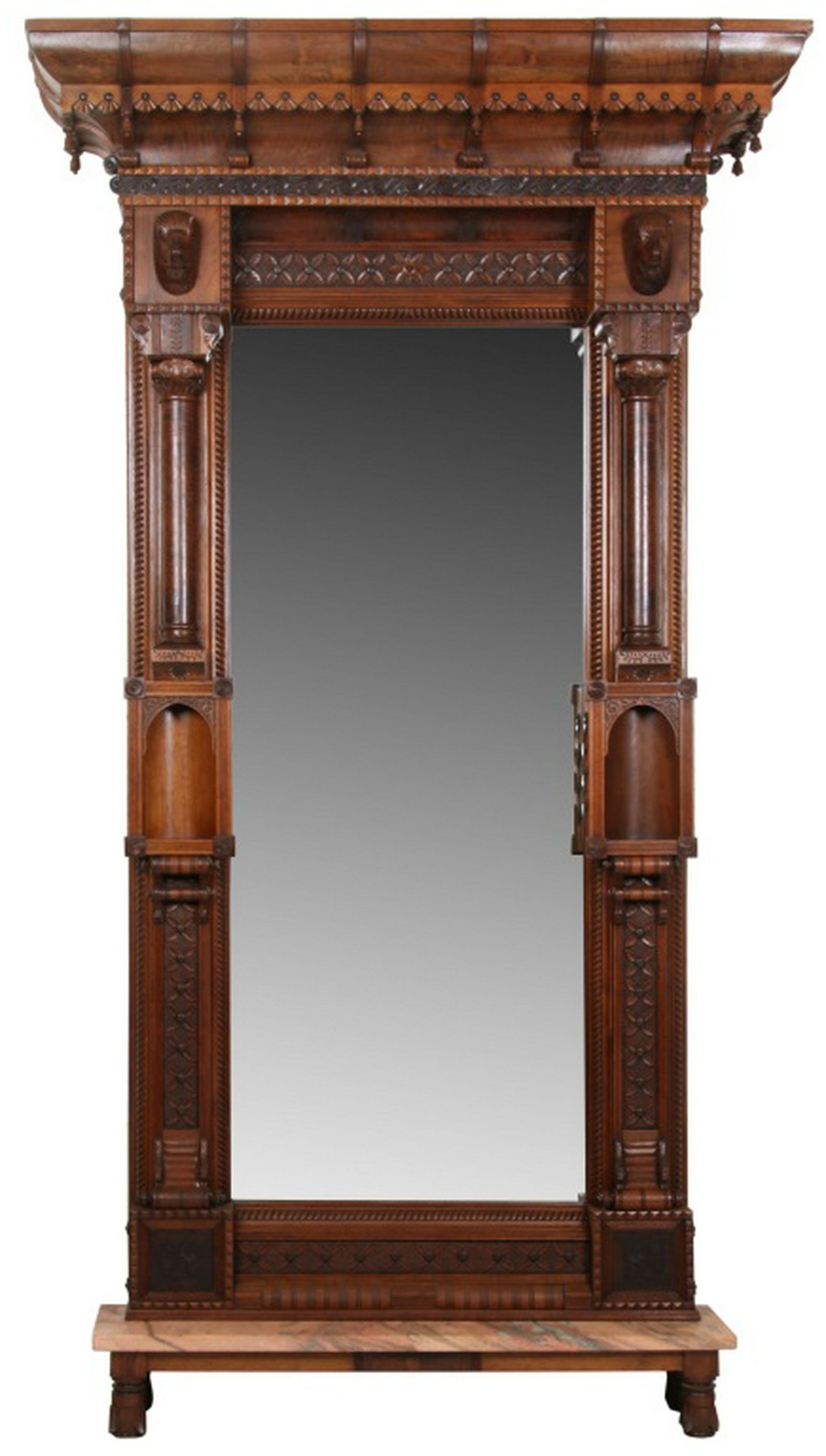 Massive Walnut Eastlake Pier Mirror: Massive Walnut Eastlake Pier Mirror. Overhanging crest has tear drop finials and fluted wooden supports, below is a band of swirling filigree, carved bear heads, and a band of flowers; the sides have 