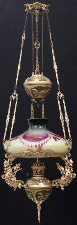Unusual Chandelier with Nautical Motif: Unusual Chandelier with Nautical Motif. Three arms branch out with sea serpents, transitioning into sailing ships with the fixture having a pull down counterbalance weight mechanism and obverse painte