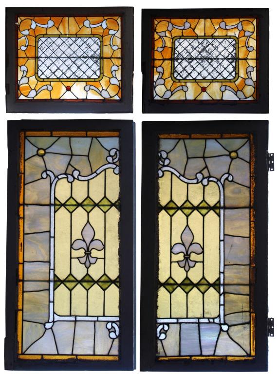 Two Pairs of Leaded Stained Glass Windows: Two Pairs of Leaded Stained Glass Windows. One pair with fleur-de-lis inside a scrolling border & the other with a striated diamond pattern. Dimensions: large windows (outside) - 33.5 in. high x 17.5