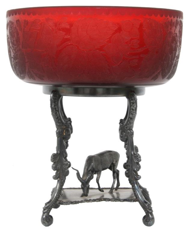 Pairpoint Ruby Glass & Figural Centerpiece: Pairpoint Ruby Glass & Figural Centerpiece. Deep ruby red glass bowl with a raised frosted decoration of flowers, leaves & vines on an ice chipped textured background. On the original silver plated ba
