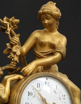 Three Piece French Gilt Bronze Figural Clock Set