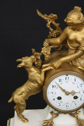 Three Piece French Gilt Bronze Figural Clock Set