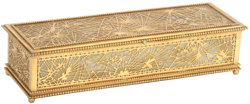 Tiffany Studios Pine Needle Glove Box: Tiffany Studios glove box has a pierced decorated gold dore pine needle pattern over caramel slag glass panels, sits on four ball feet and has 5 rows of beads all around; signed "Tiffany Studios, New 