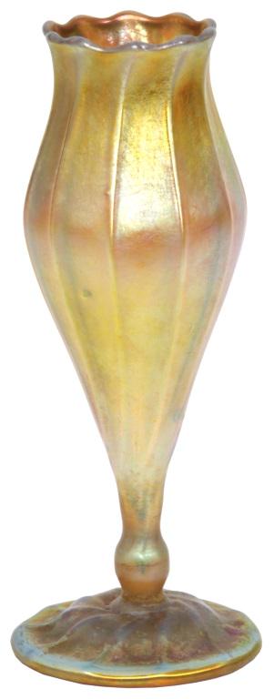 Tiffany Studios Favrile Glass Floriform Vase: Tiffany Studios Favrile glass gold iridescent art glass bud vase has a flowering form with long ribs that rise to the scalloped and flared rim; signed on the underside, "L. C. Tiffany - Favrile, 1523 