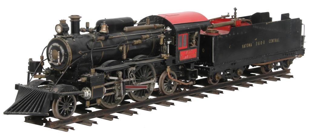 Lady Elizabeth Model Train & Tender: The large model steam locomotive has red plaques reading "Lady Elizabeth" on each side of the cab and is pulling the tender, also known as a coal-car. Exceptional quality & detail. Dimensions: 11 in. 