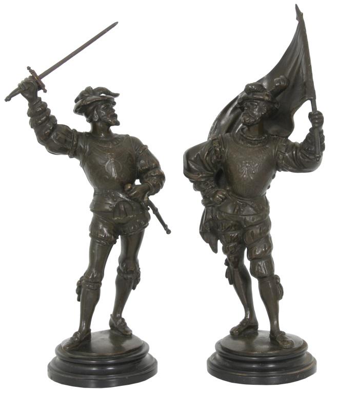 Guillaume Bronze Warrior Sculptures: Emile Guillaume (French, 1867-1942), sculptures of two warriors, one holding a sword and the other a flag, both signed on the bases, "E. Guillemin." Dimensions: 11 in. high x 4.5 in. wide x 3 in. deep