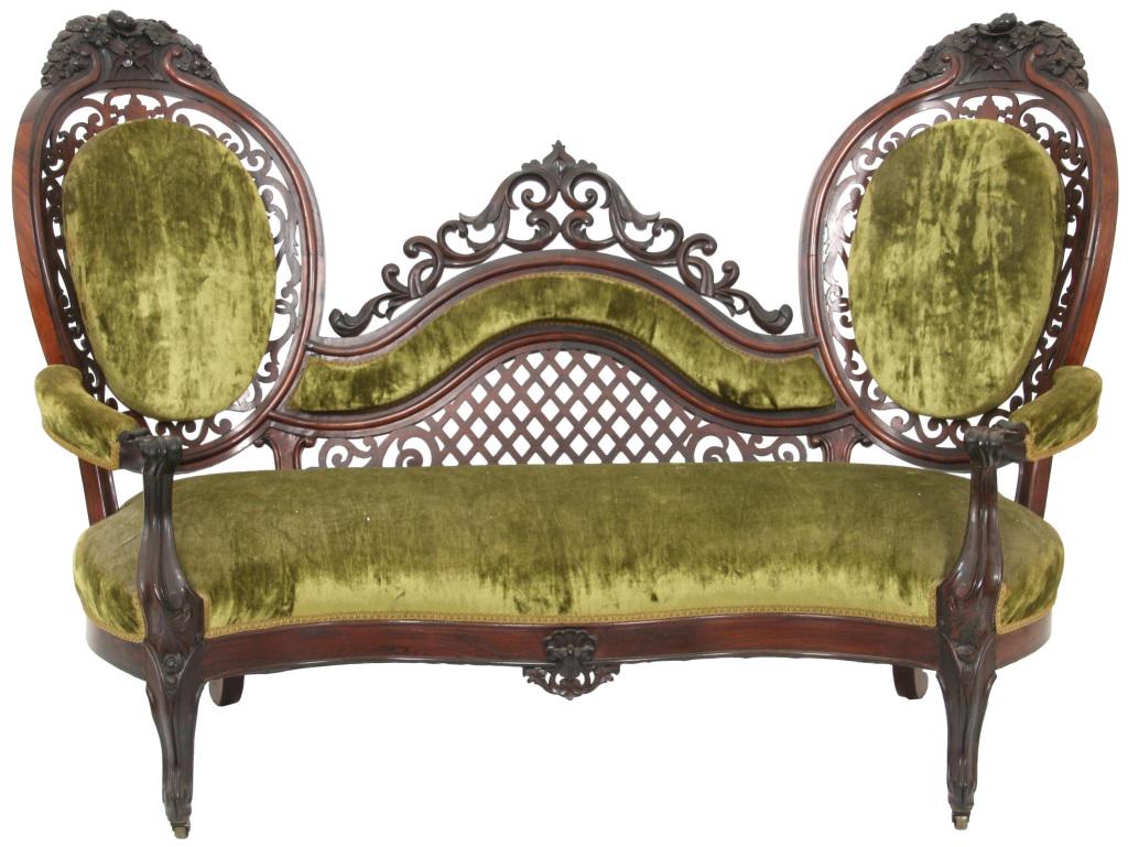 Rosewood Laminated Sofa attr. George Henkel: Rosewood triple back sofa with laminated medallion back sides on each end having a floral bouquet at the top, and a laminated center section with open carved scrollwork crest. Dimensions: 44 in. high 