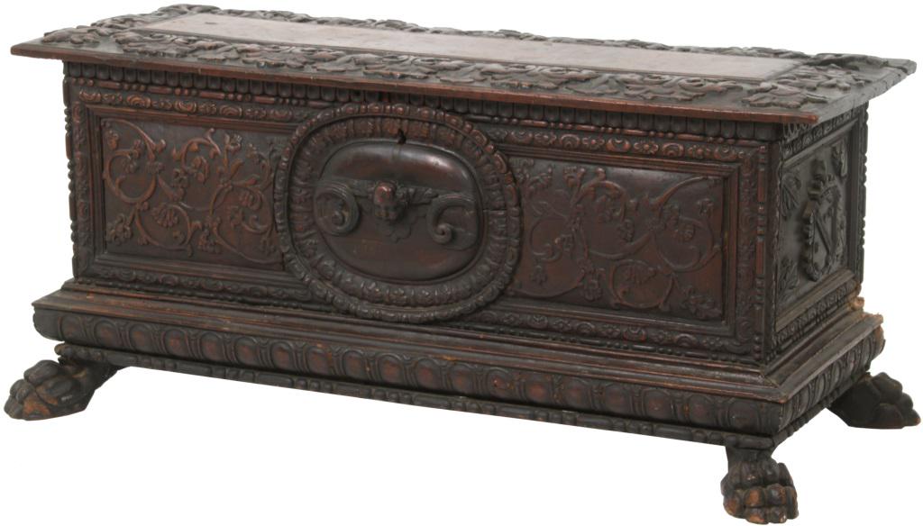17-18th Century Italian Walnut Cassone: 17-18th century Italian walnut cassone wedding chest having floral & vine carved panels with center medallion having a winged angel, carved side panels with coat of arms & claw feet . Dimensions: 23 i