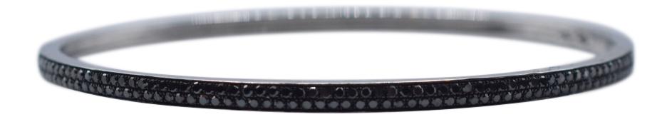 14K White Gold & Black Diamond Bangle: Metal Type: 14K White Gold Designer: Effy Gemstone: Single Cut Black Diamond Note: Color Treated Setting: Pave Gemstone Count: 131 Carat Weight: 0.72 Hallmark: 14K ; EFFY Condition: Very Good Dimensio