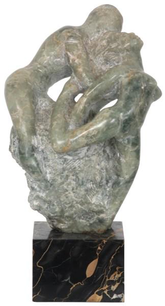 Figural Nude Carved Soapstone Sculpture: Carved green soapstone sculpture of a male dancer standing behind a female dancer, on a black marble base. 18 in. high x 9 1/2 in. wide x 5 3/4 in. deep.