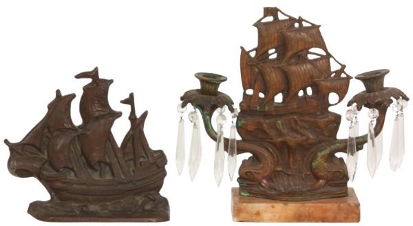 Two Cast Bronze Ship Sculptures: 1) Relief decorated bronze doorstop of the ship, "Fairfax, 1910-1930"; signed "J.T. Rawcliffe." Has a medium brown patina, in good condition. 8 in. high x 8.75 in. wide x 2 in. deep. 2) Bronze girando