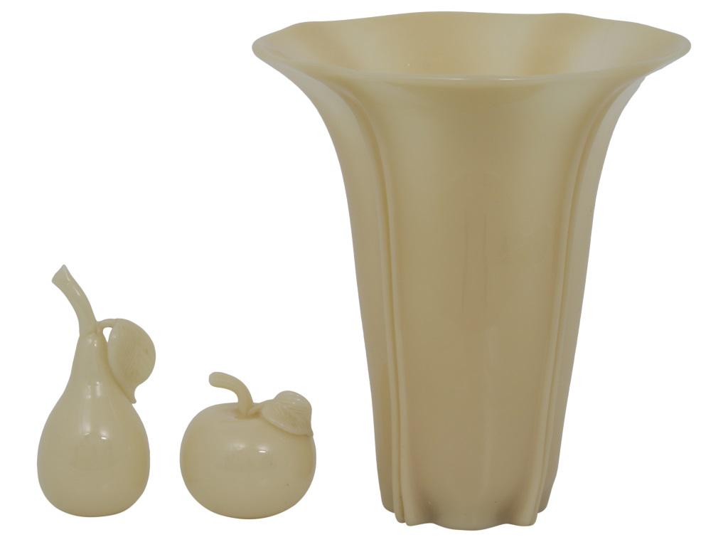 Group of Three Steuben Ivory Items: Steuben Glass Works Group of three items, including a pear, apple and trumpeted vase ivory glass unsigned early 20th century 2 3/4 in. high x 2 1/2 in. diameter (small) 9 in. high x 8 in. diameter (la