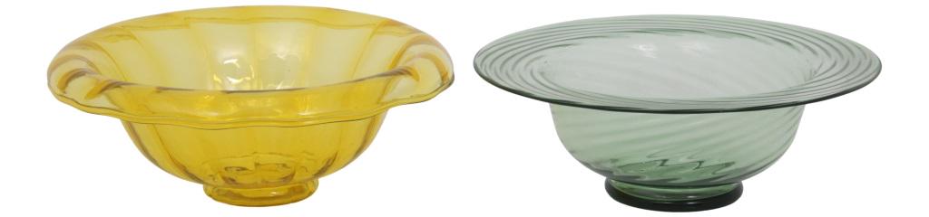 Two Steuben Glass Bowls: Steuben Glass Works Two wide bowls with ribbed bodies colored glass unsigned early 20th century 4 1/2 in high x 11 3/4 in. diameter (1) 4 in. high x 11 3/4 in. diameter (2)