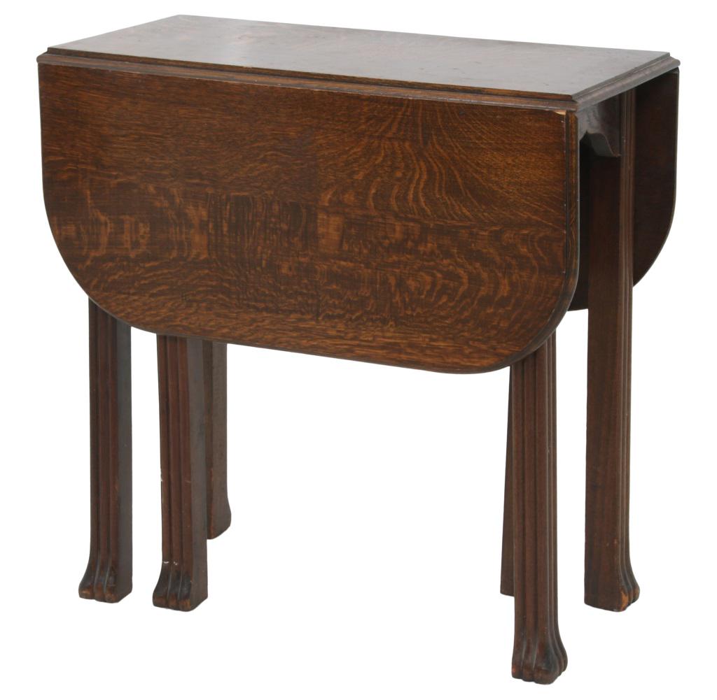 Oak Swing Leg Drop Leaf Table: Oak drop leaf table with six legs, early 20th century. 30 in. high x 29 in. wide x 14 1/2 in. deep