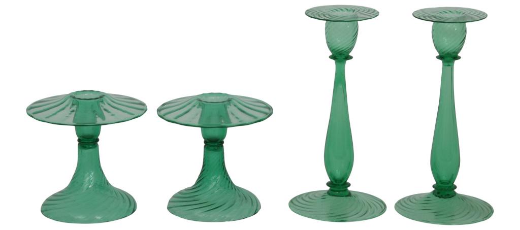 Steuben Pomona Green Candlesticks: Steuben Glass Works Two pairs of candlesticks Pomona green glass large pair signed "Steuben"; small pair signed with fleur-de-lis mark early 20th century 5 3/4 in. high x 5 3/4 in. diameter, 10 in. hi