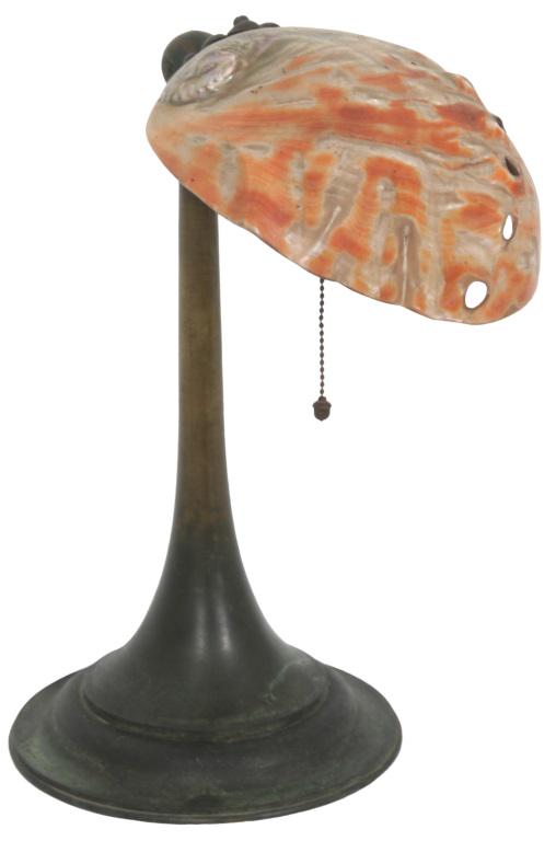 Bronze Desk Lamp with Abalone Shade: Desk lamp has a bronze base having a single light socket and an abalone shade, early 20th century. 11 1/2 in. high (total), 5 in. wide x 6 1/4 in. deep (shade)