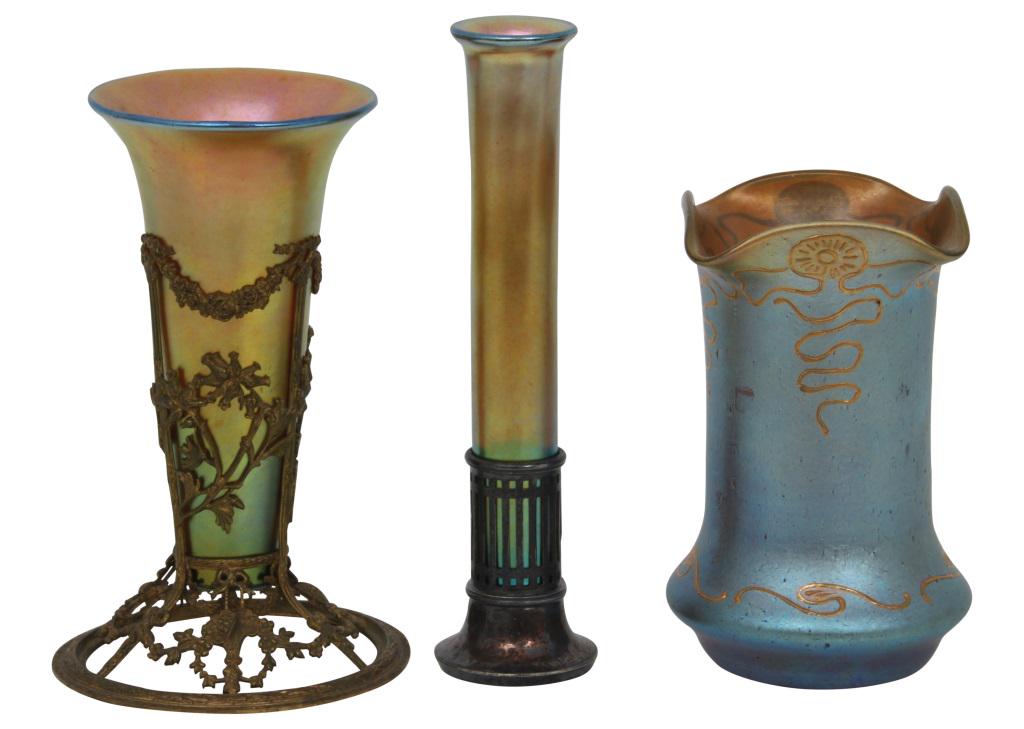 Steuben Vase & 2 Art Glass Vases: Group of three art glass vases, including two with gold iridescent inserts and one with blue iridescence, decorative motifs. Smallest: 4 3/4 in. high x 3 1/4 in. diameter, largest: 6 1/2 in. high x 1 