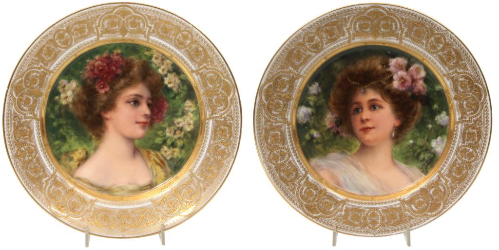 Pair of Franz Dorfl Plates: Pair of Franz Dorfl plates depict portraits of woman with flowers in their hair and are set against flowers and foliage. The borders have gold enameled filigree set against white backgrounds. Very goo