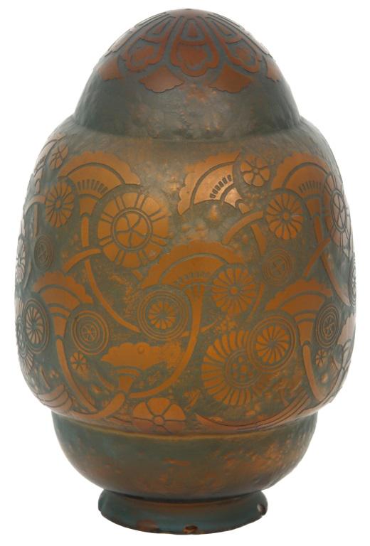 Attr. Steuben Acid Cut Back Shade: Attributed to Steuben acid cut back shade is decorated with a stylized Art Deco floral pattern on an amber glass background. Good condition with fitter chips. 10 in. high x 6 3/4 in. diameter.