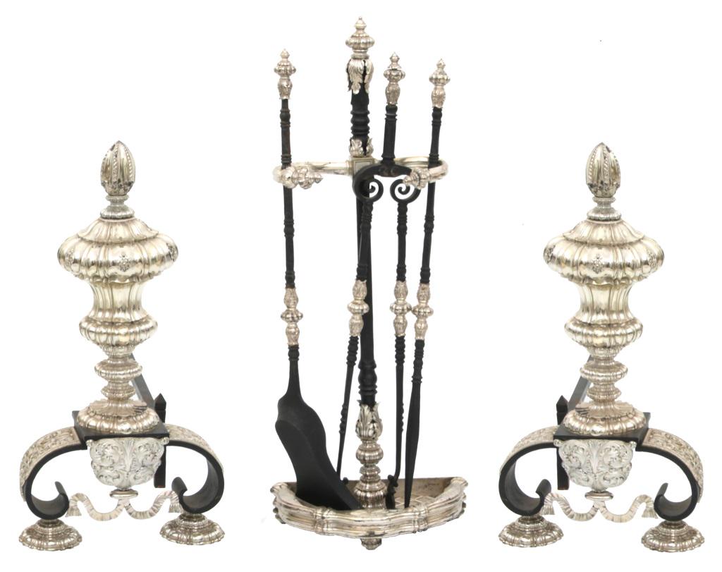 E.F. Caldwell Andirons & Tools: E.F. Caldwell & Co. Pair of andirons and fireplace tools cast iron, silvered bronze unsigned early 20th century 25 1/2 in. high x 12 1/2 in. wide x 32 in. deep (andirons)