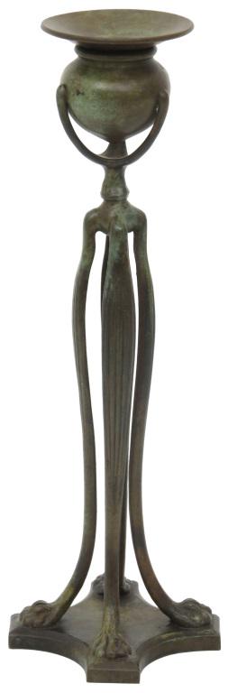 Tiffany Studios "Cat's Paw" Candlestick: Tiffany Studios "Cat's Paw" candlestick has four tapering, serpentine shaped legs that end in cat's paw feet which attach to the platform base; signed on the underside, "Tiffany Studios New York 1201.