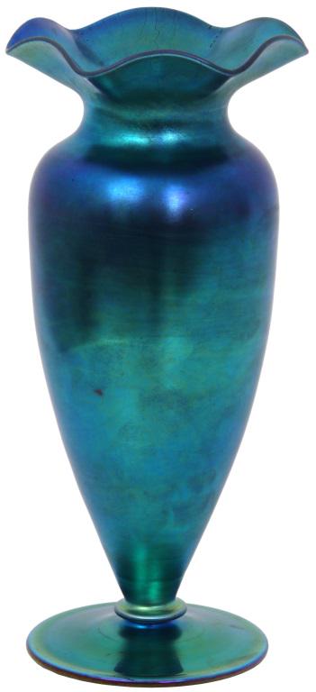 Steuben Blue Aurene Vase: Steuben blue Aurene vase has a flaring and ruffled rim with onion skin on the interior and exterior; the slender form body is attached with a ring to the large round foot. Signed on the underside, "Au