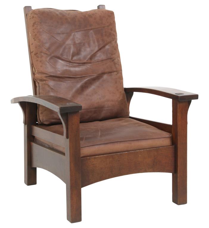 Gustav Stickley No. 336 Morris Chair: Gustav Stickley No. 336 oak Morris chair has a four slat adjustable curved back, corbels under the bowed arms, slatted hip supports and legs exposed through the arms, refinished & unsigned, early 20th