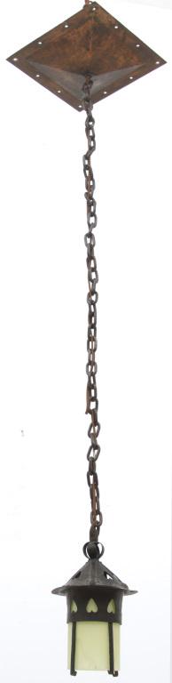 Gustav Stickley Heart Pendant Lantern: Gustav Stickley wrought and hammered copper hanging lantern has a square pyramidal shaped canopy extending down to the cylindrical form lantern having heart cut outs and original glass insert. 46 in. 