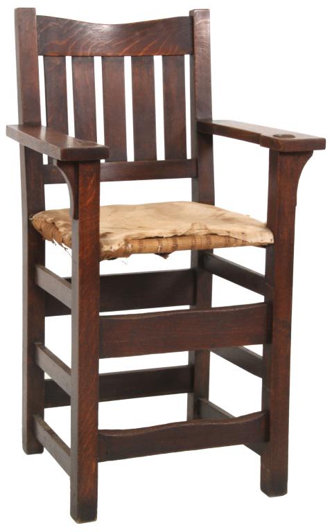 Gustav Stickley Billiard Chair: Gustav Stickley "V" back billiard chair is constructed in oak with five vertical back slats and curved corbels under the arms with legs exposed through the top, unsigned, early 20th century. 46 in. hi