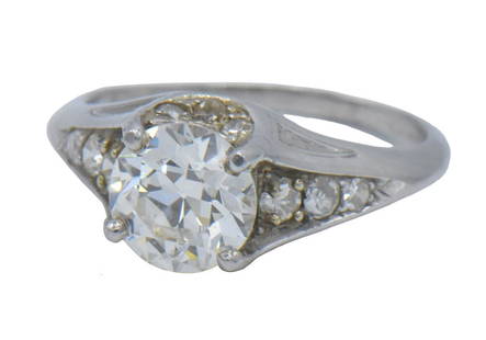 Platinum & 1.50 ct. Diamond Ring: Metal Type: PlatinumGemstone: Round Brilliant DiamondSetting: ProngGemstone Count: 1Clarity: S12Color: ICut: GoodCarat Weight: 1.50Gemstone: Single Cut DiamondSetting: PaveGemstone Count: 12Carat