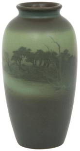 Rookwood Pottery Green Vellum Vase: Rookwood Pottery vase is decorated with a landscape scene and has a green vellum glaze; marked on the underside with flame mark dating it to 1912, shape number 922C, V for Vellum, GV for Green