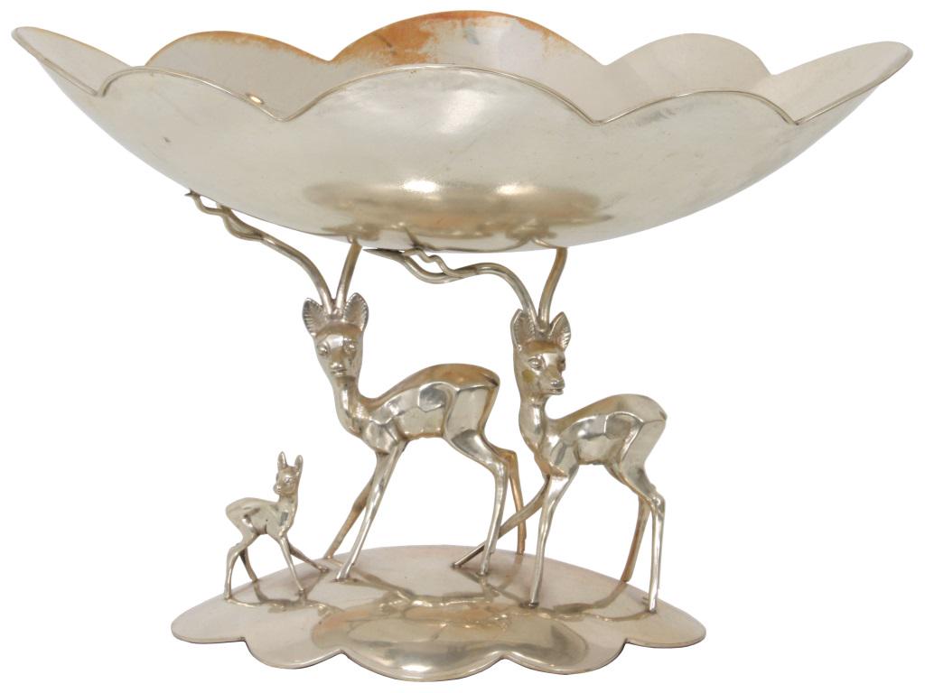Figural Hallmarked Silver Compote: Hallmarked silver compote is decorated with a baby fawn deer standing beside two adult deer that support the scalloped bowl. Marked with hallmarks on the top of the base. Very good condition with no d
