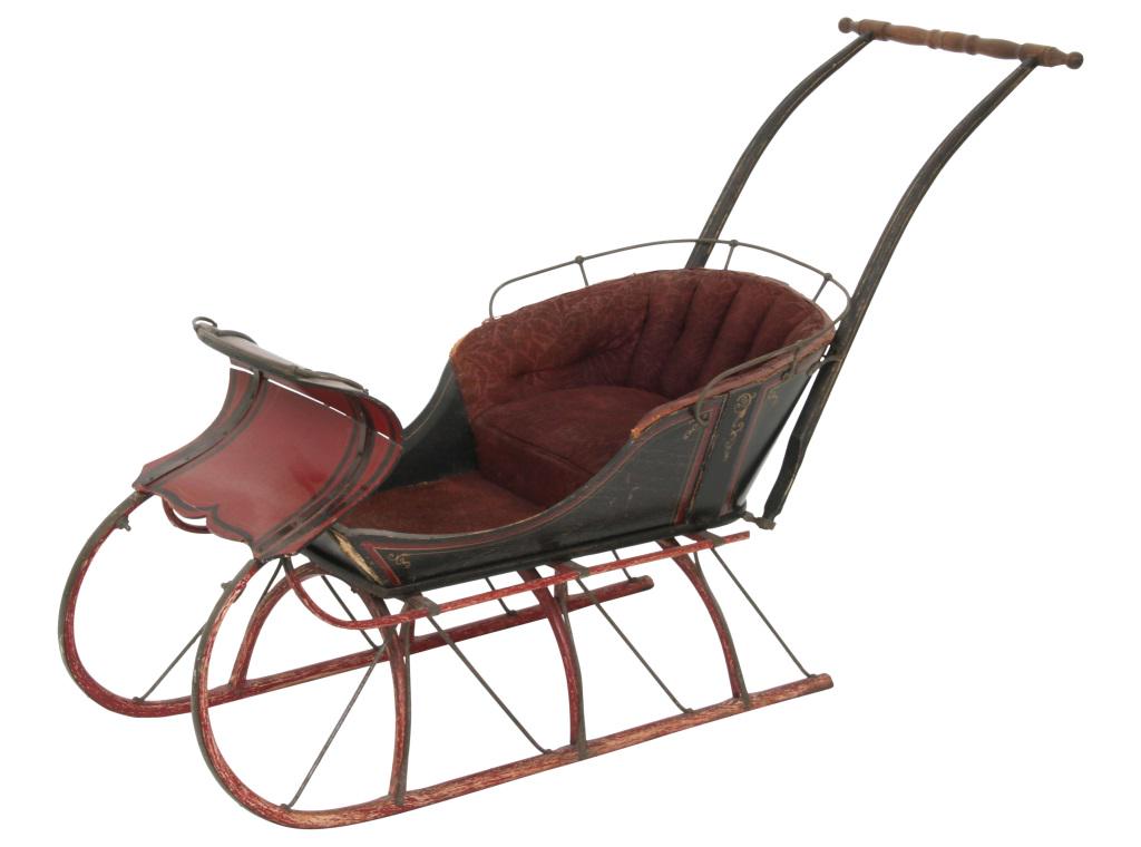 Wooden Child's Sleigh: Wooden child's sleigh with original paint decoration. 32 in. high x 18 in. wide x 50 in. deep.