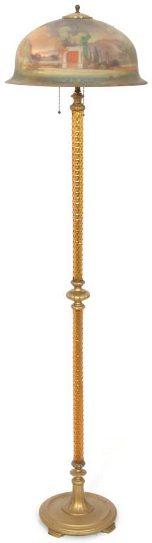 Pairpoint Reverse Painted Floor Lamp: Pairpoint floor lamp has a reverse-painted shade decorated with a garden scene, supported by a gilt metal base with an amber cut glass column. 62 in. high x 16 in. diameter (base), 7 in. high x 16 in.